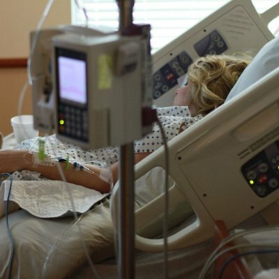 woman laying in hospital bed